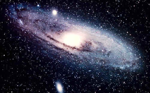 The Andromeda Galaxy. 2.9 Million Light Years away, this image of M31 reveals an exploding awareness - ours. Human destiny is evolving from life's thirst for greater perception, memory and responsiveness.